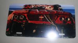 Beat Up Dodge License Plate